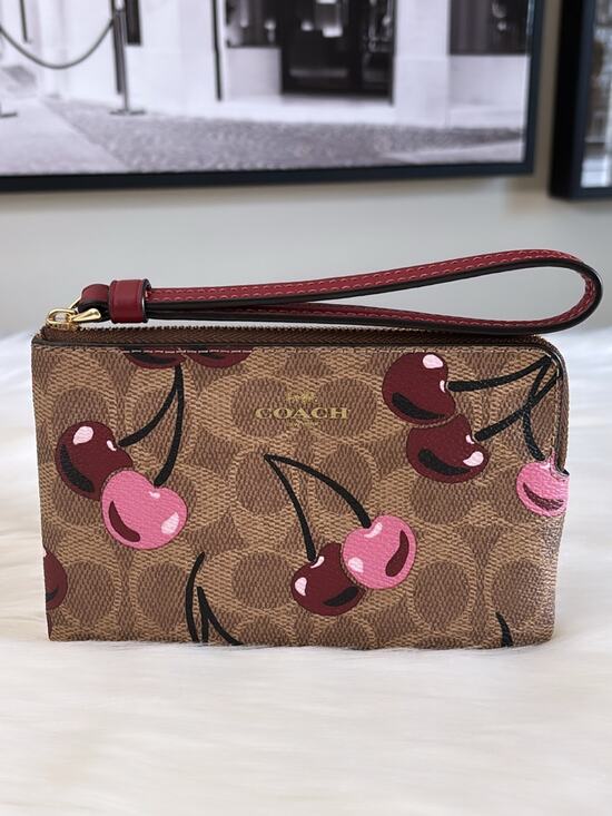 Coach Handbags - Coach Cherry Print Signature Wristlet in Brown and Pink